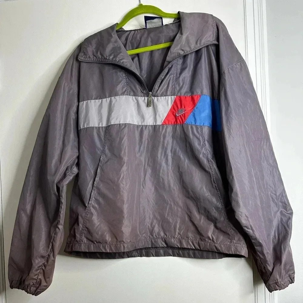 VTG 1980’s  Nike Blue Label Grey pullover windbreaker 1/4 Zip. Embroidered Logo.